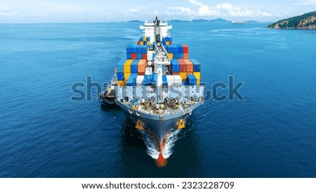 Cargo container Ship, cargo maritime ship with contrail in the ocean ship carrying container and running for export concept technology freight shipping sea freight by Express Ship. front view Royalty-Free Stock Photo #2323228709