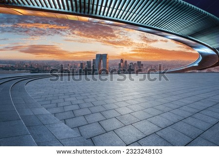 Empty square floors and city skyline with modern buildings at sunset in Suzhou, Jiangsu Province, China. high angle view. Royalty-Free Stock Photo #2323248103