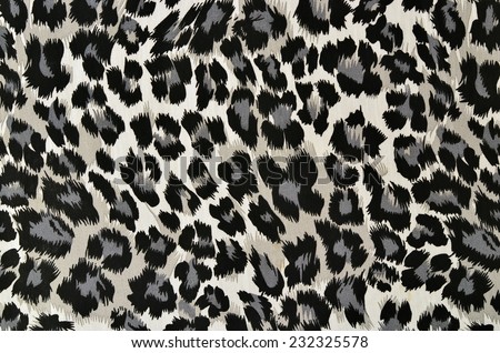Grey and black leopard pattern.  Spotted animal print as background.