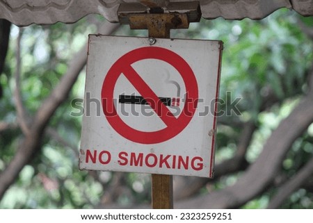 NO SMOKING Signboard near a public park. 