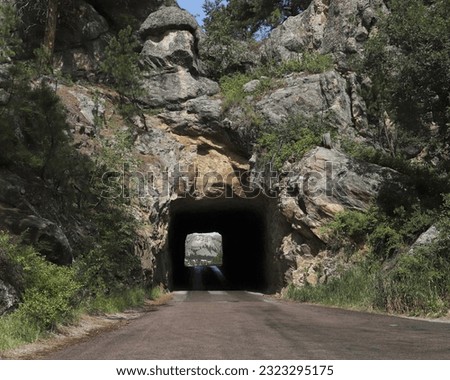 Mount Rushmore through a tunnel on Iron Mountain Road, Black Hills, South Dakota