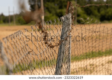 Fence in the nature, stop do not go, chain on the fence