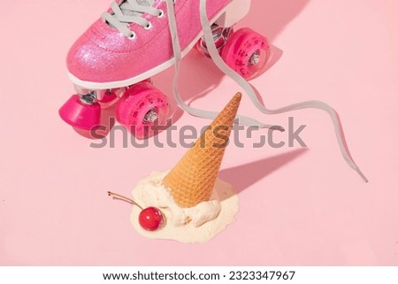 Summer creative layout with pink roller skates and ice cream cone up side down and vanilla ice cream scoop with bright red cherry on pastel pink background. 80s or 90s retro aesthetic fashion idea. Royalty-Free Stock Photo #2323347967