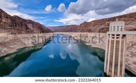 Scenic view of Colorado River seen from Hoover Dam near Mike O'Callaghan Pat Tillman Memorial Bridge, Nevada Arizona, USA. Blue turquoise water from Lake Mead surrounded by River mountain range Royalty-Free Stock Photo #2323364015