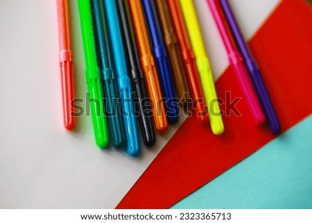 Colorful Wooden Crayons and flomasters on white background stock photo