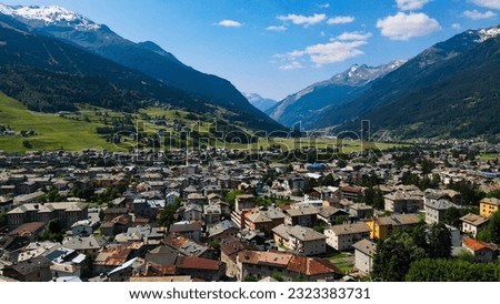 Aerial view of Bormio, mountain village in Valtellina. Important ski station in the Italian Alps, Panoramic view near Passo dello Stelvio. Dolomites Alps, Province of Sondrio, Lombardia, Italia.
