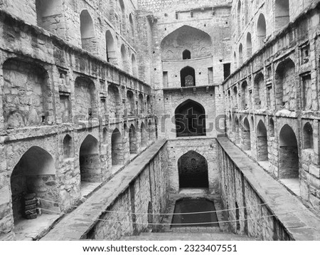 This is the inscription of "Agrasen ki Baoli" where you can see all the purposes behind this Baoli created.Agrasen Ki Baoli (Step Well) situated in the middle of Connaught placed New Delhi India, Old  Royalty-Free Stock Photo #2323407551