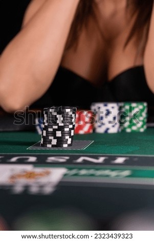 Woman  playing BlackJack at the casino - Shallow depth of field
