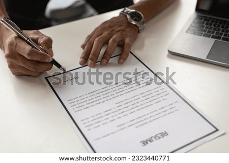 Signing a contract, filling out a personal resume form to prepare for applying for a job in a field that has graduated as a human resource of the company