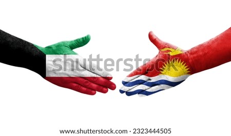 Handshake between Kiribati and Kuwait flags painted on hands, isolated transparent image.