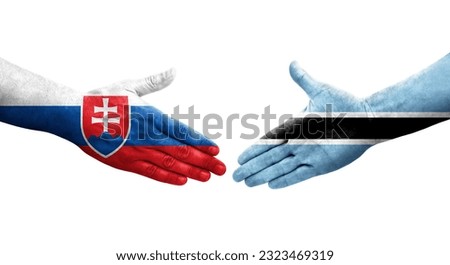 Handshake between Botswana and Slovakia flags painted on hands, isolated transparent image.