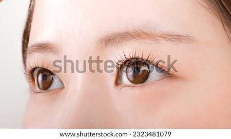 Up the eyes of a young Japanese woman Royalty-Free Stock Photo #2323481079
