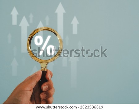 magnifying glass with percentage sign and up arrow icon Increased interest and dividends from investments Returns from stock funds