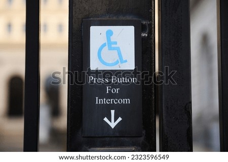 The blue handicap sign on the street - a universal symbol for accessibility and mobility aid for individuals with disabilities