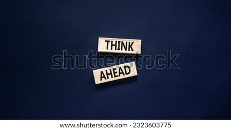 Think ahead symbol. Concept words Think ahead on wooden blocks on a beautiful black table black background. Business, support, motivation, psychological and think ahead concept. Copy space. Royalty-Free Stock Photo #2323603775