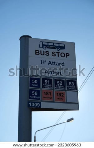 A vertical shot of the Bus Stop sign in Malta