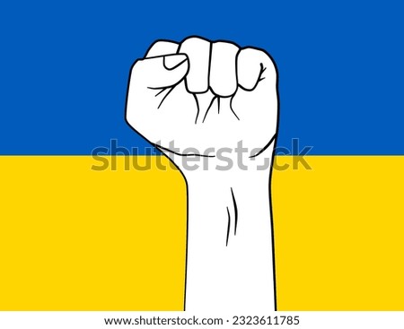 A clenched fist on the Ukraine flag background