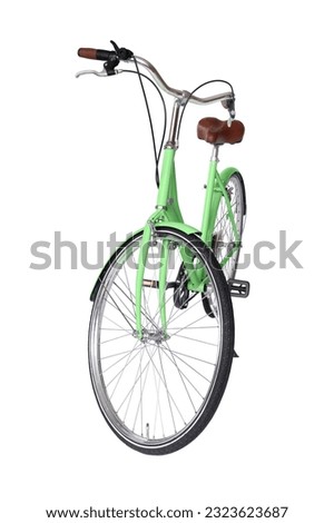 Green retro bicycle with brown saddle and handles, generic bike front view Royalty-Free Stock Photo #2323623687