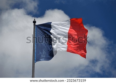 Paris, France-05 07 2021: French flag fluttering in the wind, Paris, France. Royalty-Free Stock Photo #2323673159