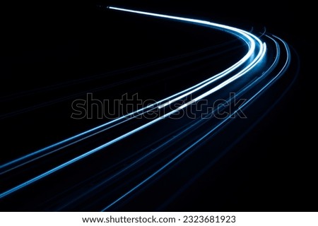 blue car lights at night. long exposure Royalty-Free Stock Photo #2323681923