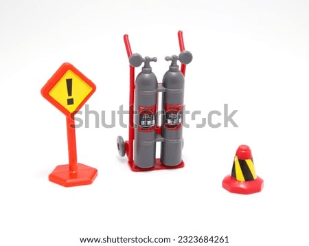 Security elements. Fire extinguisher, warning sign, caution cone. Graphic resource for security measures. Isolated.	