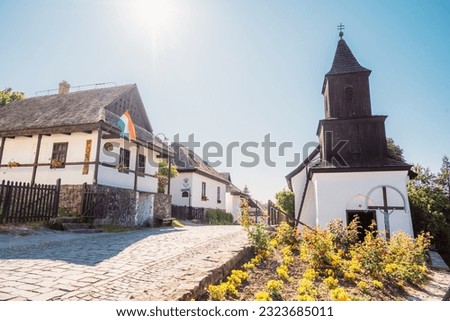 Historical village center of Holloko, region Northern Hungary. unesco. Traditional catholic church of Holloko