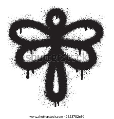 Dragonfly icon graffiti with black spray paint