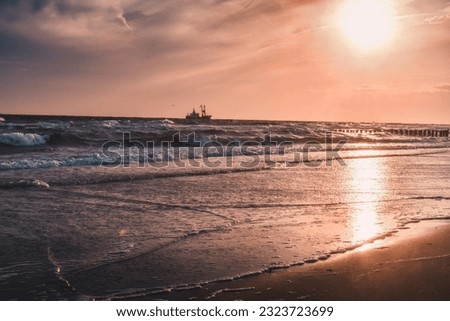 background boat with sunset on the beach