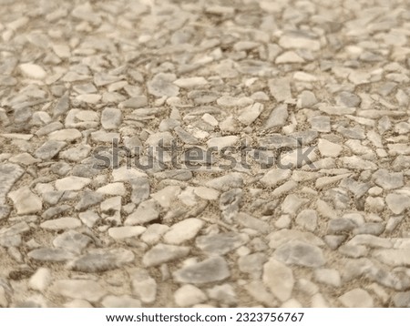 Rough surface of small grained stone pattern