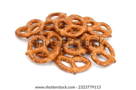Crispy pretzels on white background Royalty-Free Stock Photo #2323779113
