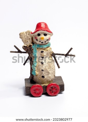 old Christmas doll on white background