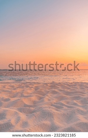 Closeup beach coast sand texture with warm gold orange sunset light. Fantasy beach landscape sky sea bay. Tranquil relax bright horizon, colorful sky. Peaceful nature seascape. Summer Mediterranean Royalty-Free Stock Photo #2323821185