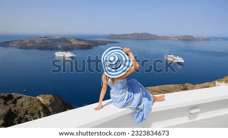 Happy in summer with young woman  leisure  as sunbating with mediterranean sea at Santorini island greece Royalty-Free Stock Photo #2323834673