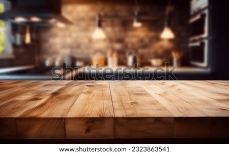 Beautiful empty brown wooden table top and blurred defocused modern kitchen interior background with daylight flare, product montage display Royalty-Free Stock Photo #2323863541
