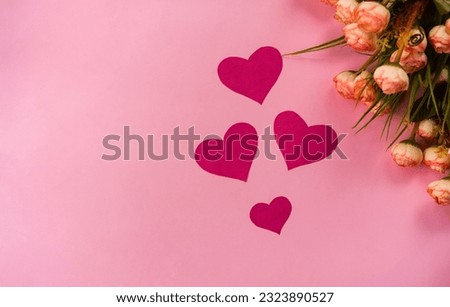 valentines day concept background, flatly image of heart shape with flowers isolated on pink colour background
