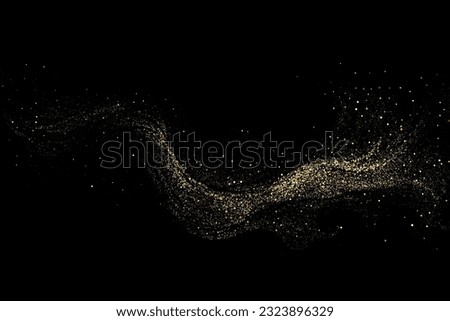 Scattered golden particles on a dark background.Festive background or design element. Royalty-Free Stock Photo #2323896329