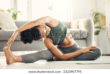 Stretching, yoga and woman on a living room floor for training, exercise or mental health at home. Legs, stretch and lady with flexible fitness or pilates workout for balance, meditation or wellness Royalty-Free Stock Photo #2323907795