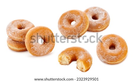 Classic sugary donuts isolated on white background Royalty-Free Stock Photo #2323929501