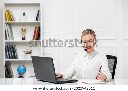 customer service cute blonde girl office shirt with headset and computer taking down notes