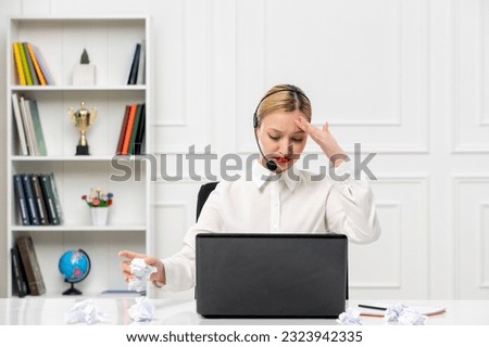 customer service cute blonde girl office shirt with headset and computer tired