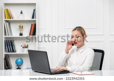 customer service cute blonde girl office shirt with headset and computer talking to a client