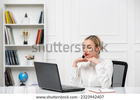 customer service cute blonde girl office shirt with headset and computer holding hands on chin