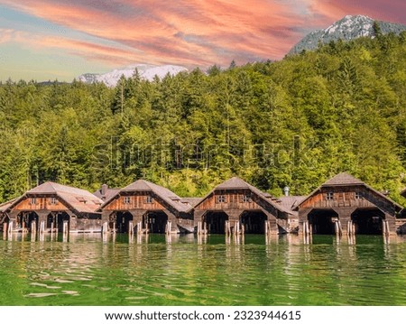 Boathouses in Schoenau am Koenigssee Berchtesgaden Alps Royalty-Free Stock Photo #2323944615
