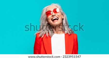 senior pretty businesswoman expressing a concept Royalty-Free Stock Photo #2323951547