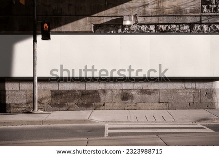 Blank Billboard Mockup on Street Wall Royalty-Free Stock Photo #2323988715
