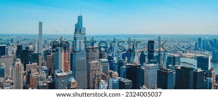 a view of Midtown Manhattan, in New York City, United States, facing Long Island City, in the other side of East River, in a panoramic format to use as web banner