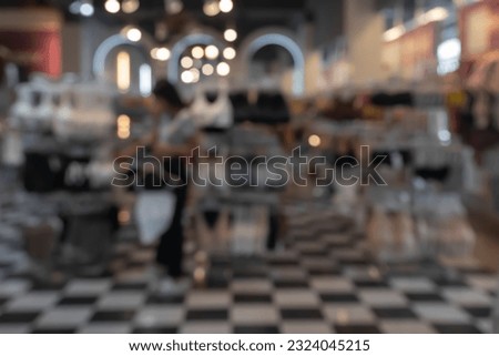 Blur background of fashion clothing store.