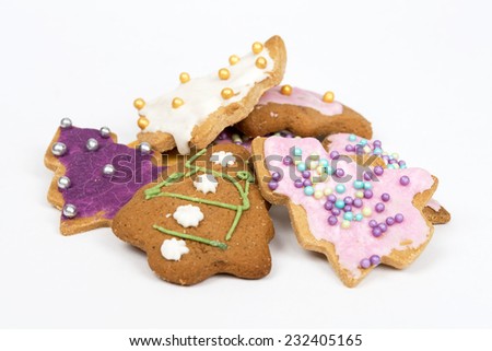 Homemade christmas gingerbread cookies on a white background