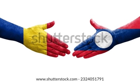 Handshake between Laos and Romania flags painted on hands, isolated transparent image.