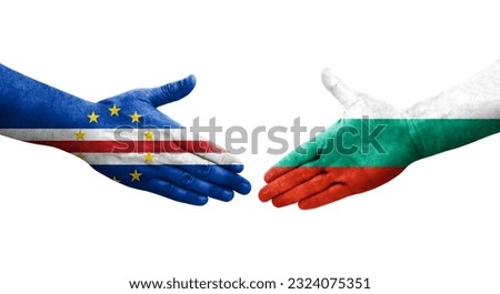 Handshake between Bulgaria and Cape Verde flags painted on hands, isolated transparent image.